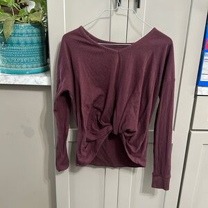 Garnet cropped shirt.